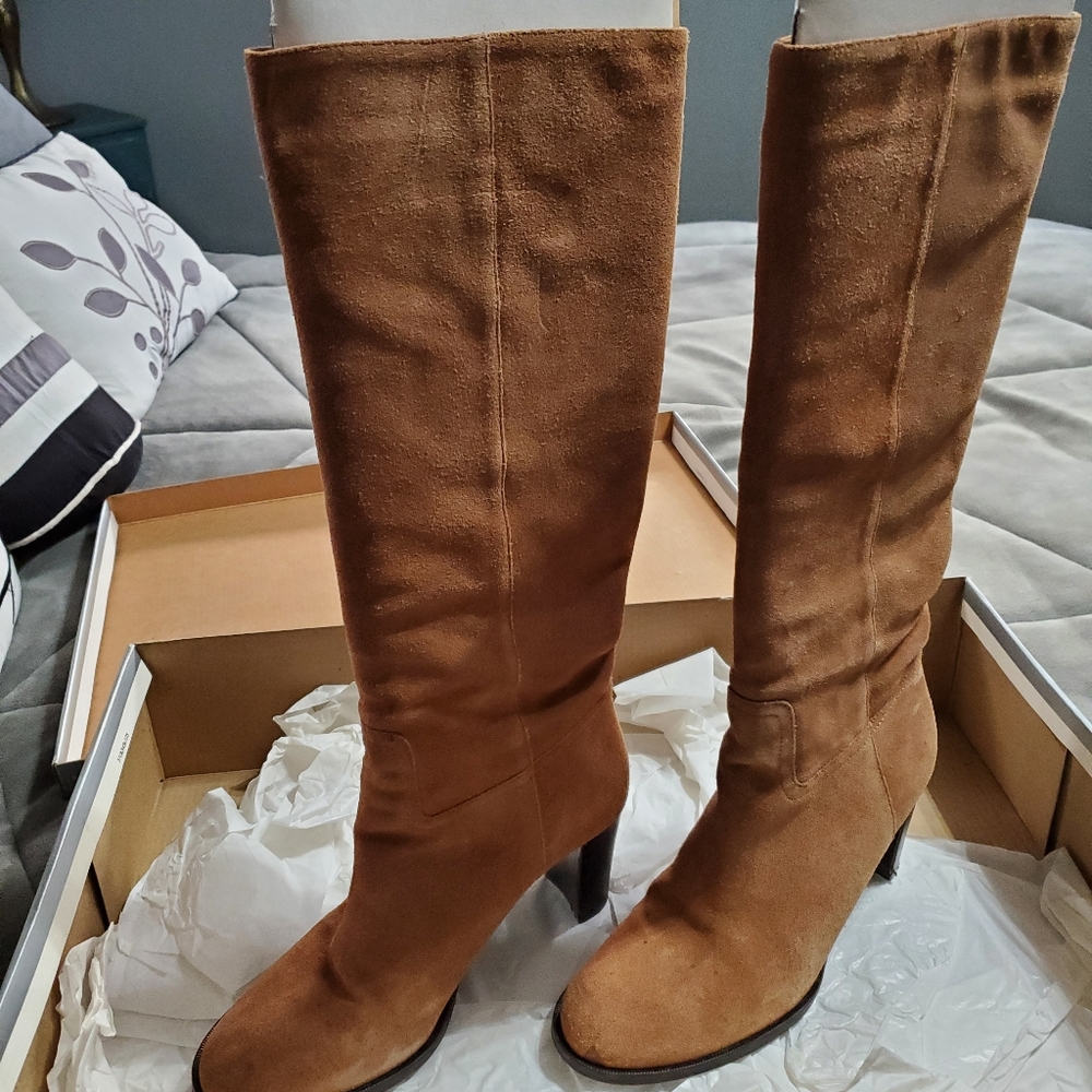Cute knee high suede boots.